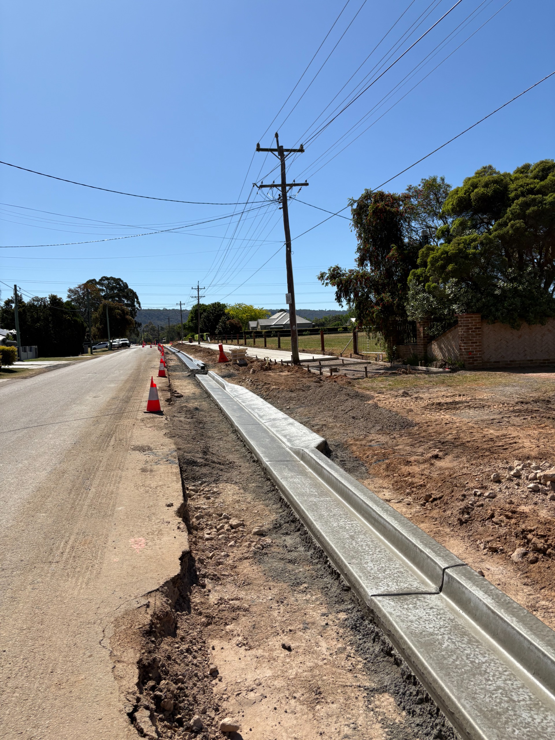 New kerb and guttering along Factory Road.