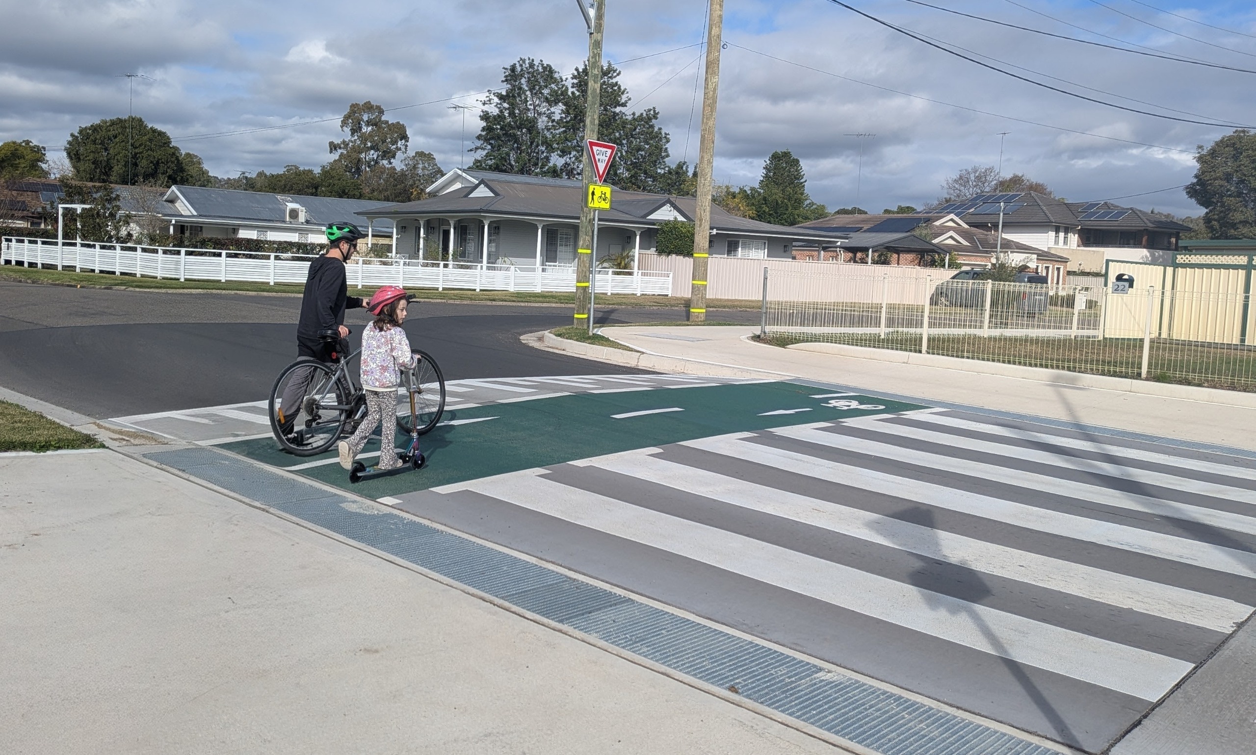 People using a pedestrian crossing