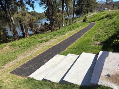A photo of the stairs leading to the pathway
